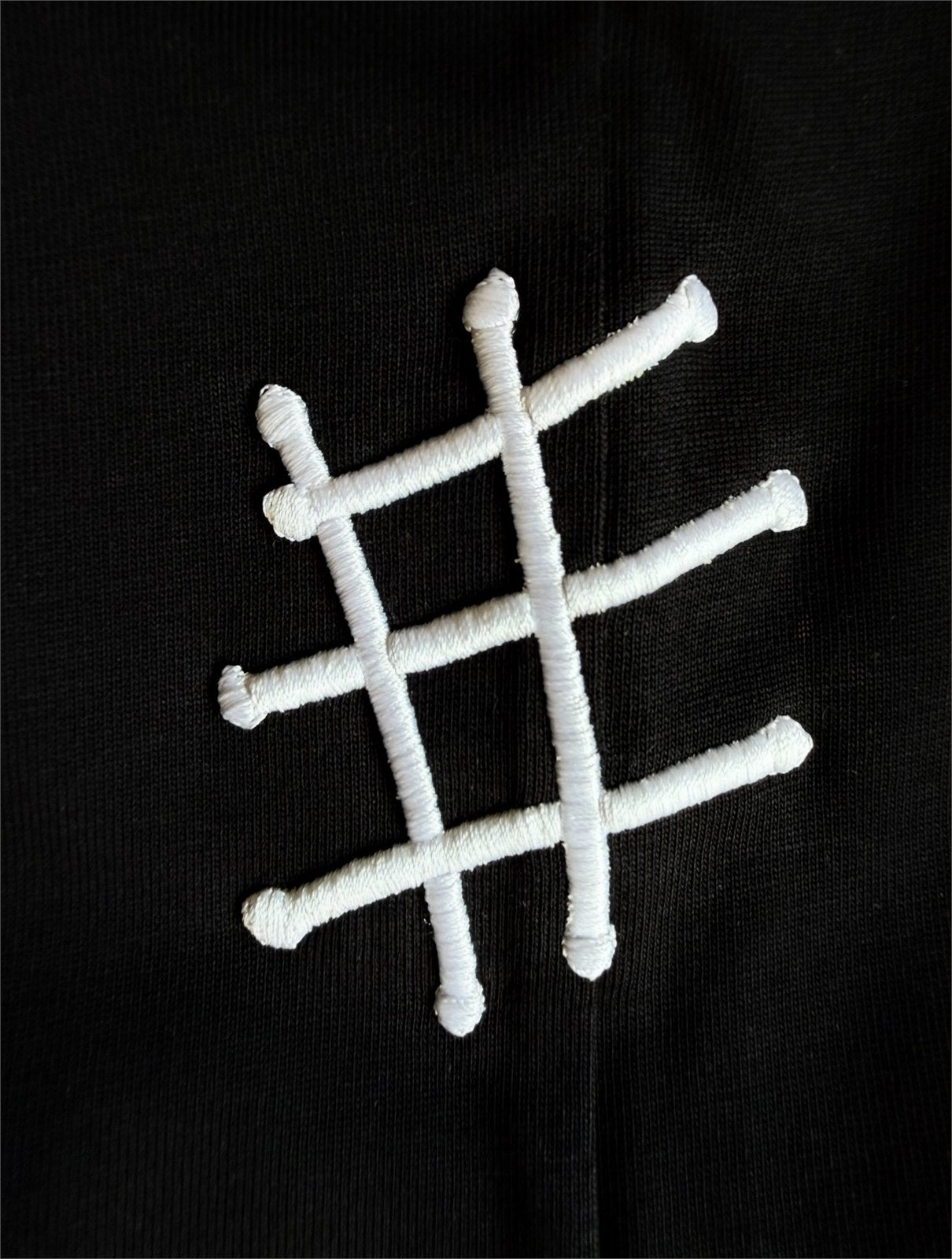 The Stitched Tee - Black material detail 4